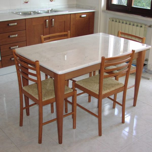 Elevate your space with this elegant white Carrara marble table top, featuring soft grey veins.
