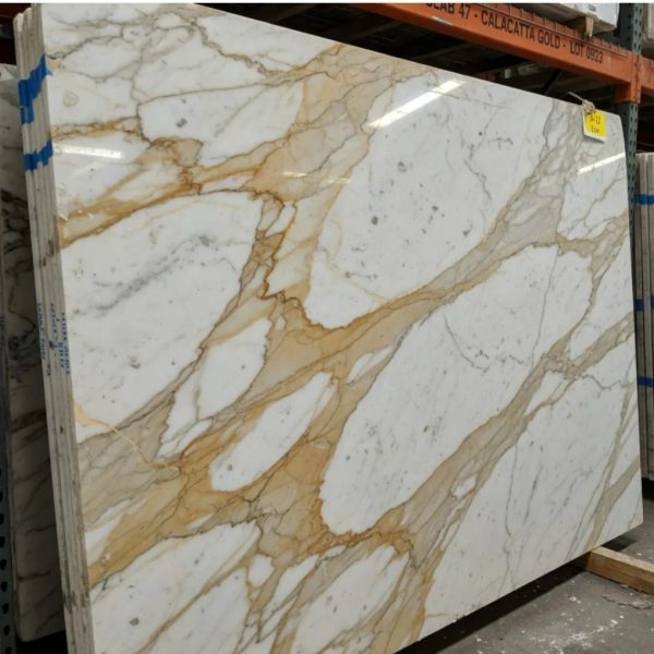 Premium Calacatta Gold marble, known for its refined and luxurious appearance