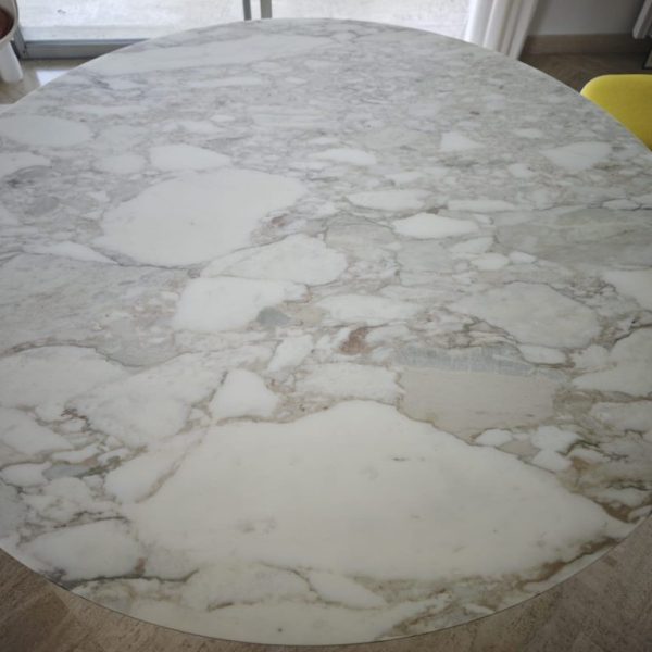 Calacatta Oro Table brings timeless elegance with its striking white marble, bold gray veining, and refined golden accents.